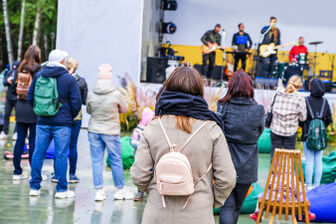 People watching band perform